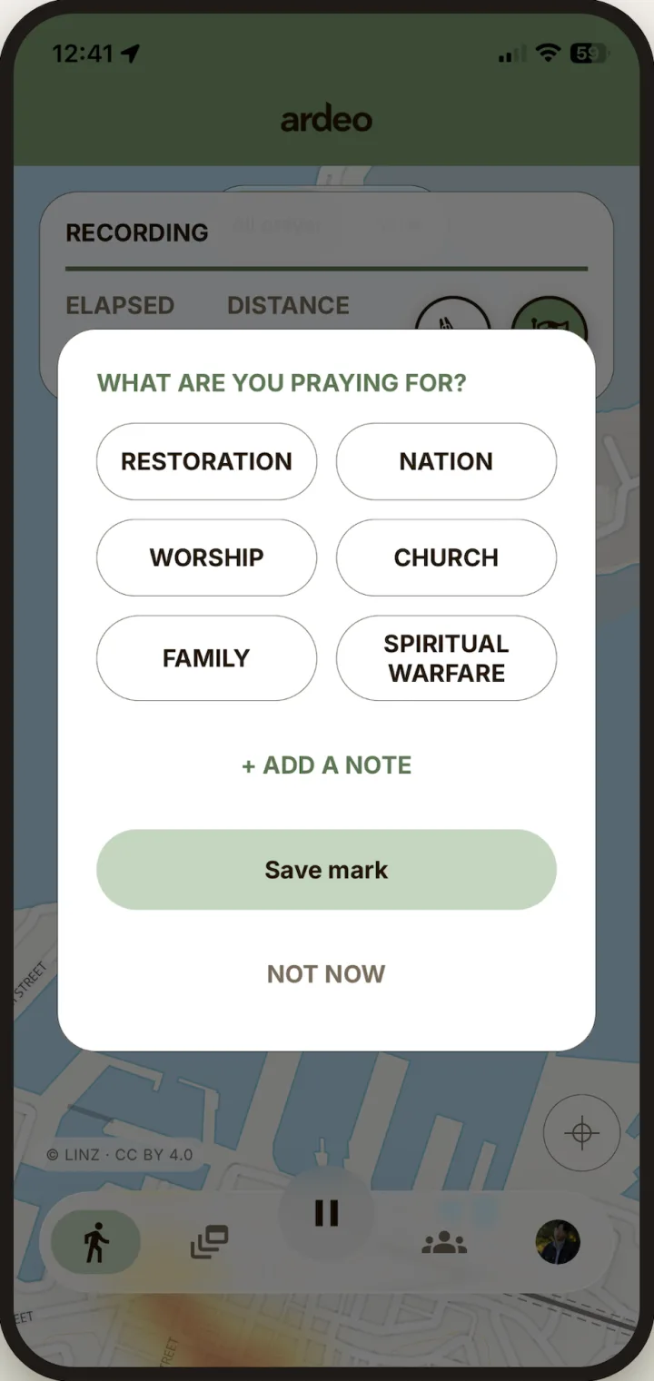 Marking a prayer during a walk: a sheet asks what you're praying for, with choices like restoration, nation, worship, church, family and spiritual warfare.